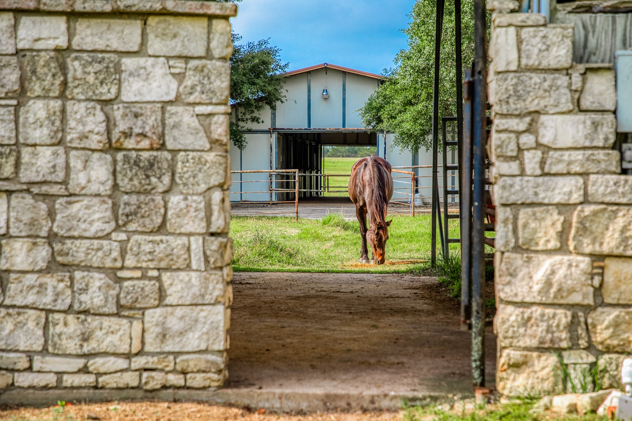 7023 Wolters Road Schulenburg, TX 78956 - Photo 38 of 49 a view of a entrance gate of the house