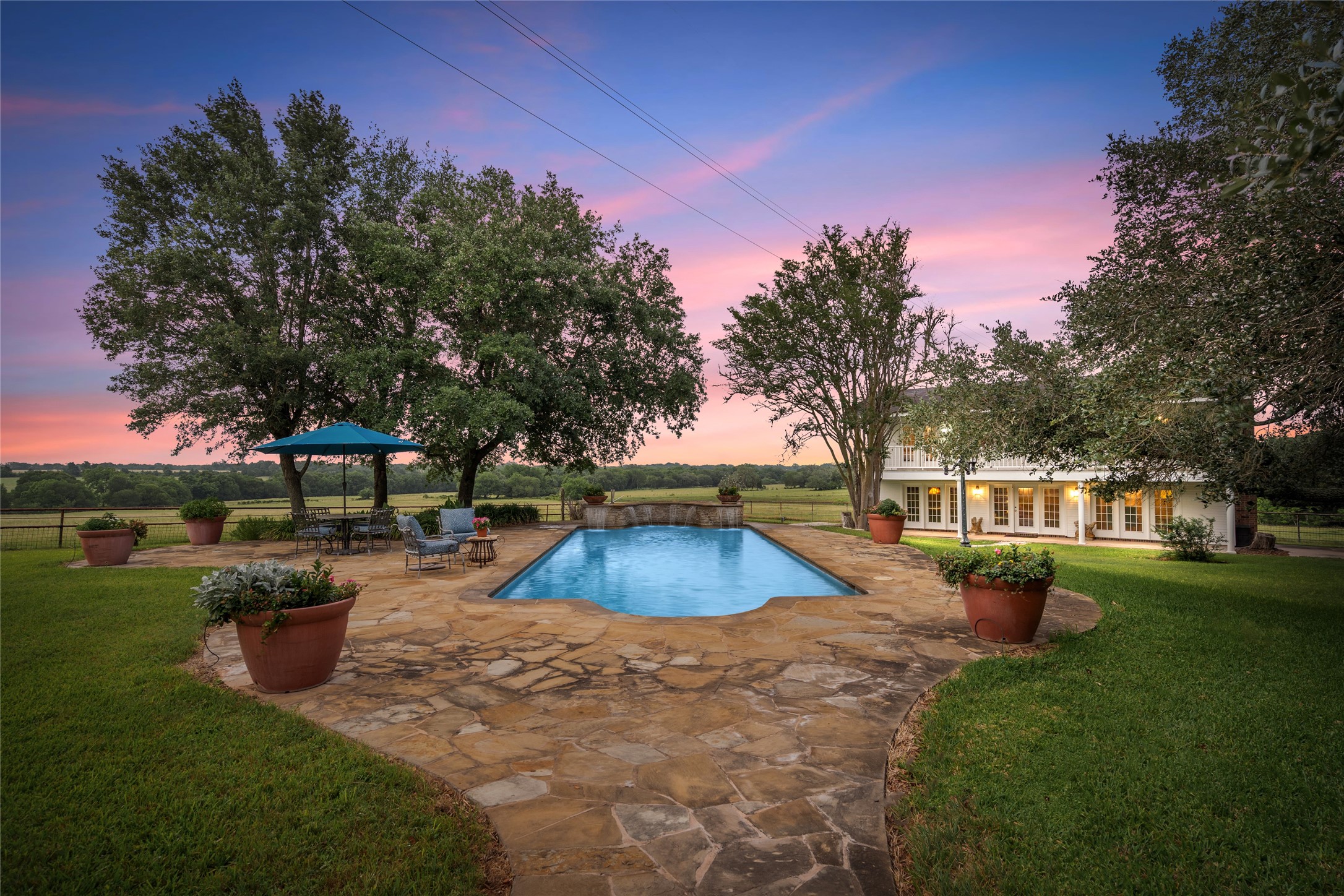 7023 Wolters Road Schulenburg, TX 78956 - Photo 9 of 49 a view of a house with swimming pool and sitting area
