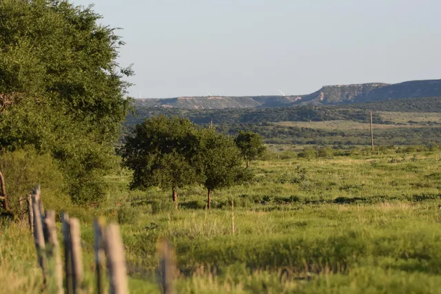a view of lake with mountain