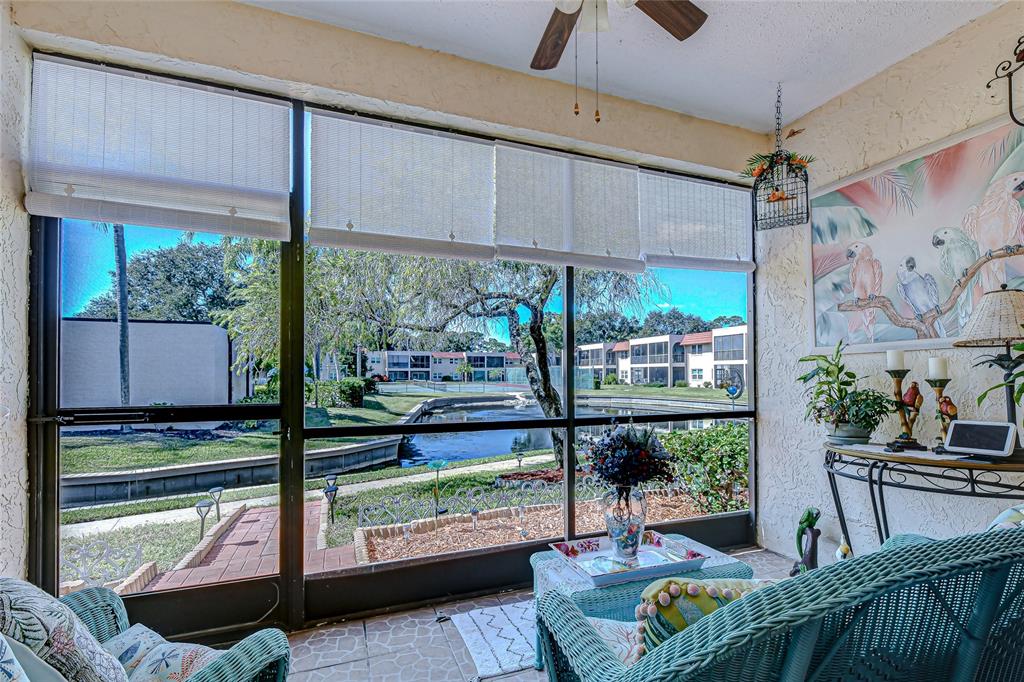 9700 Starkey Road, Unit 111 Seminole, FL 33777 - Photo 25 of 46 a living room with furniture
