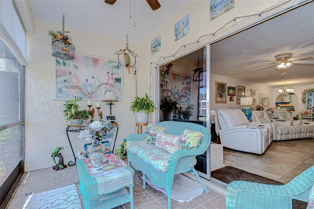 9700 Starkey Road, Unit 111 Seminole, FL 33777 - Photo 27 of 46 a living room with furniture and wooden floor