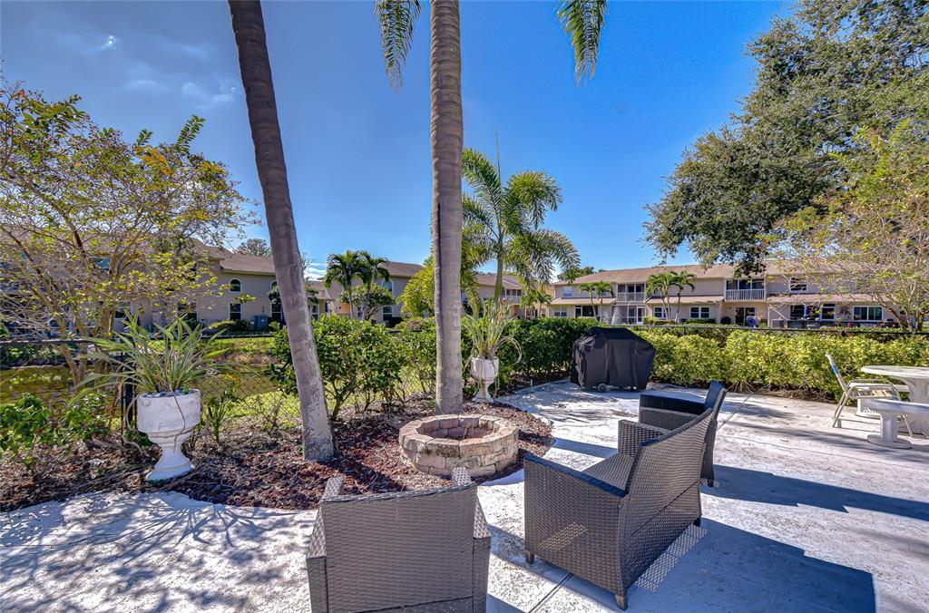 9700 Starkey Road, Unit 111 Seminole, FL 33777 - Photo 38 of 46 a outdoor living space with furniture