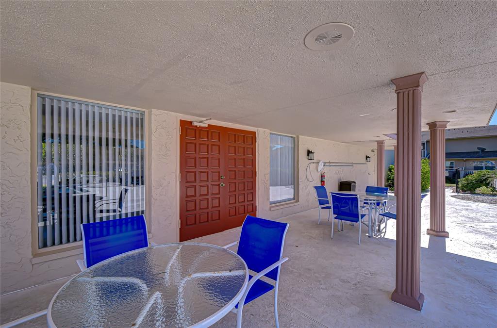 9700 Starkey Road, Unit 111 Seminole, FL 33777 - Photo 39 of 46 a living room with furniture and a window