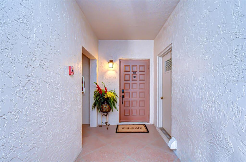 9700 Starkey Road, Unit 111 Seminole, FL 33777 - Photo 5 of 46 a view of an empty room and a window