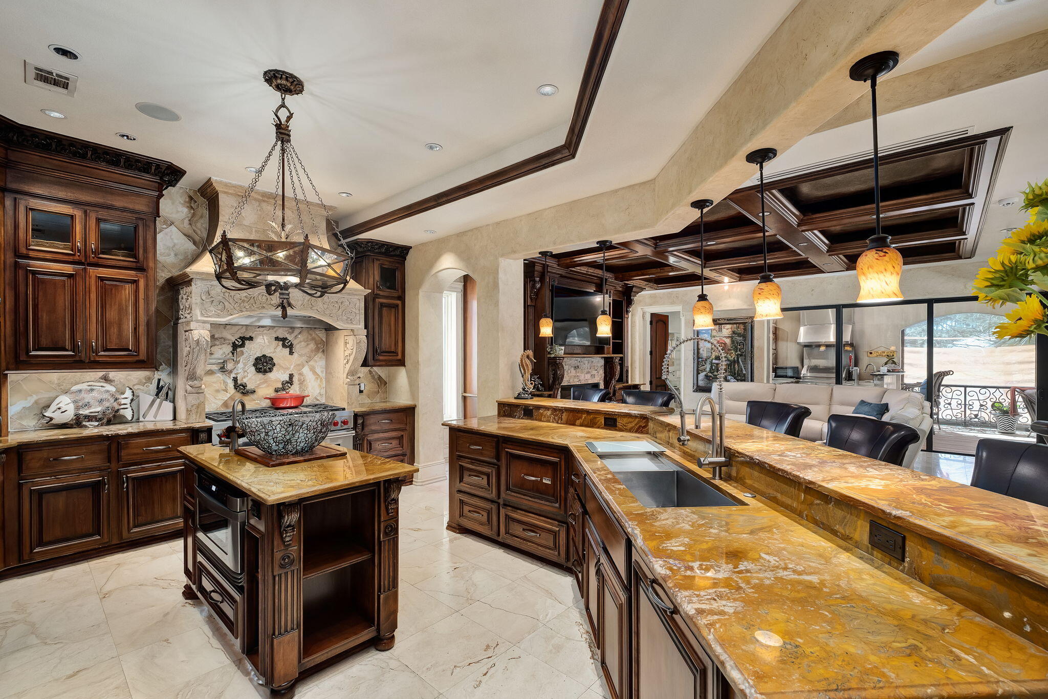 437 Admiral Court Destin, FL 32541 - Photo 38 of 100 a kitchen with stainless steel appliances granite countertop a stove and a sink