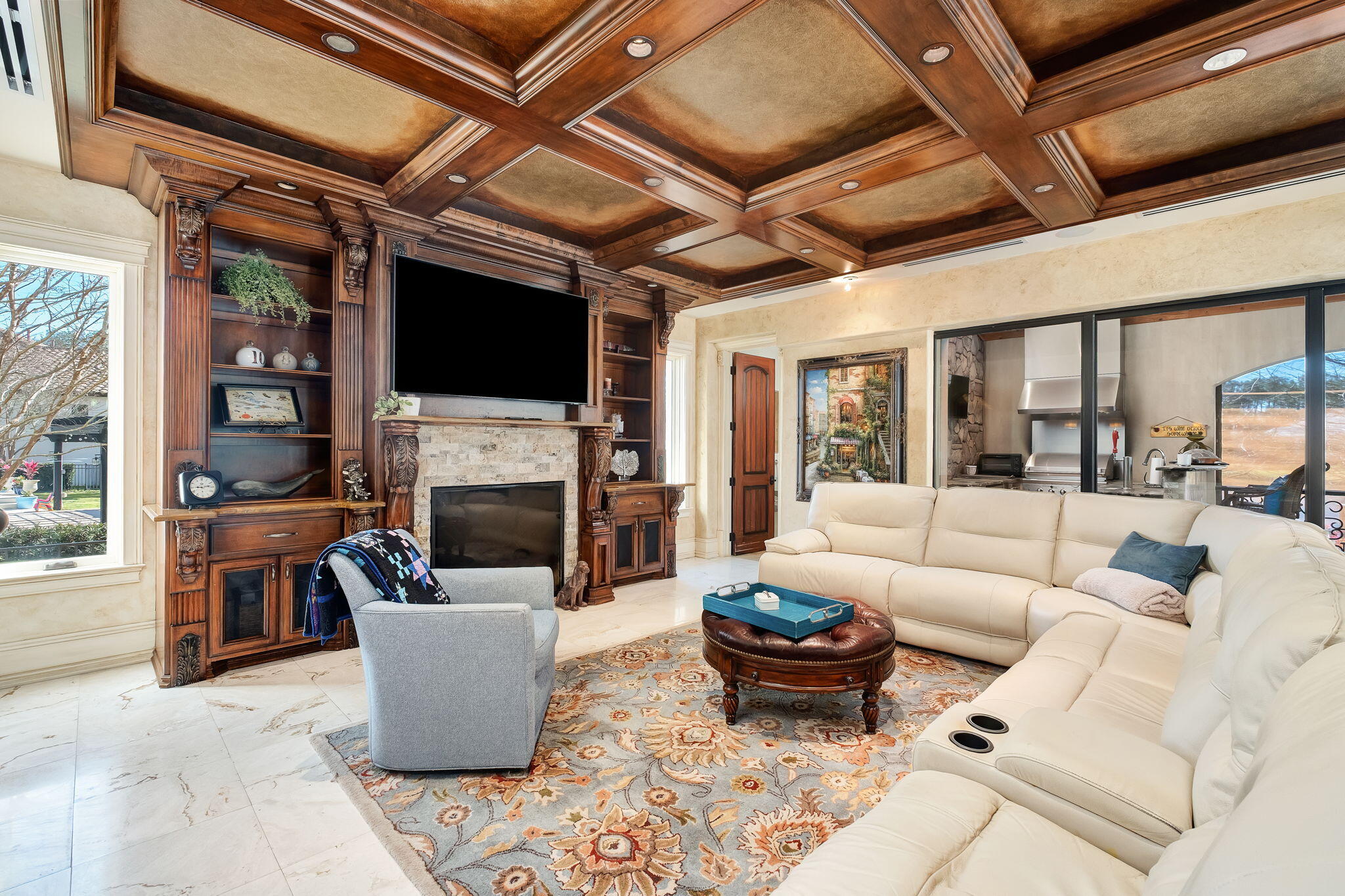 437 Admiral Court Destin, FL 32541 - Photo 47 of 100 a living room with furniture a fireplace and a flat screen tv