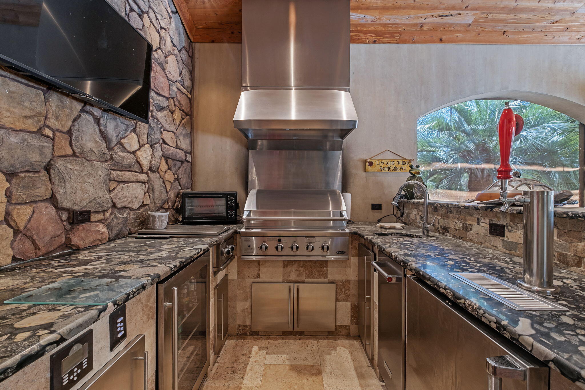 437 Admiral Court Destin, FL 32541 - Photo 49 of 100 a kitchen with a stove and a sink