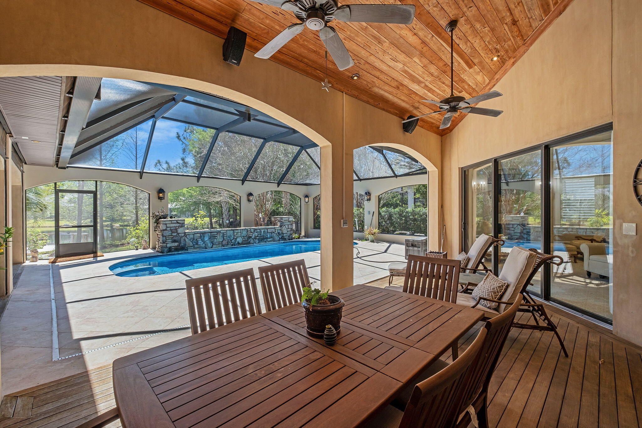 437 Admiral Court Destin, FL 32541 - Photo 50 of 100 a view of a patio with dining table and chairs