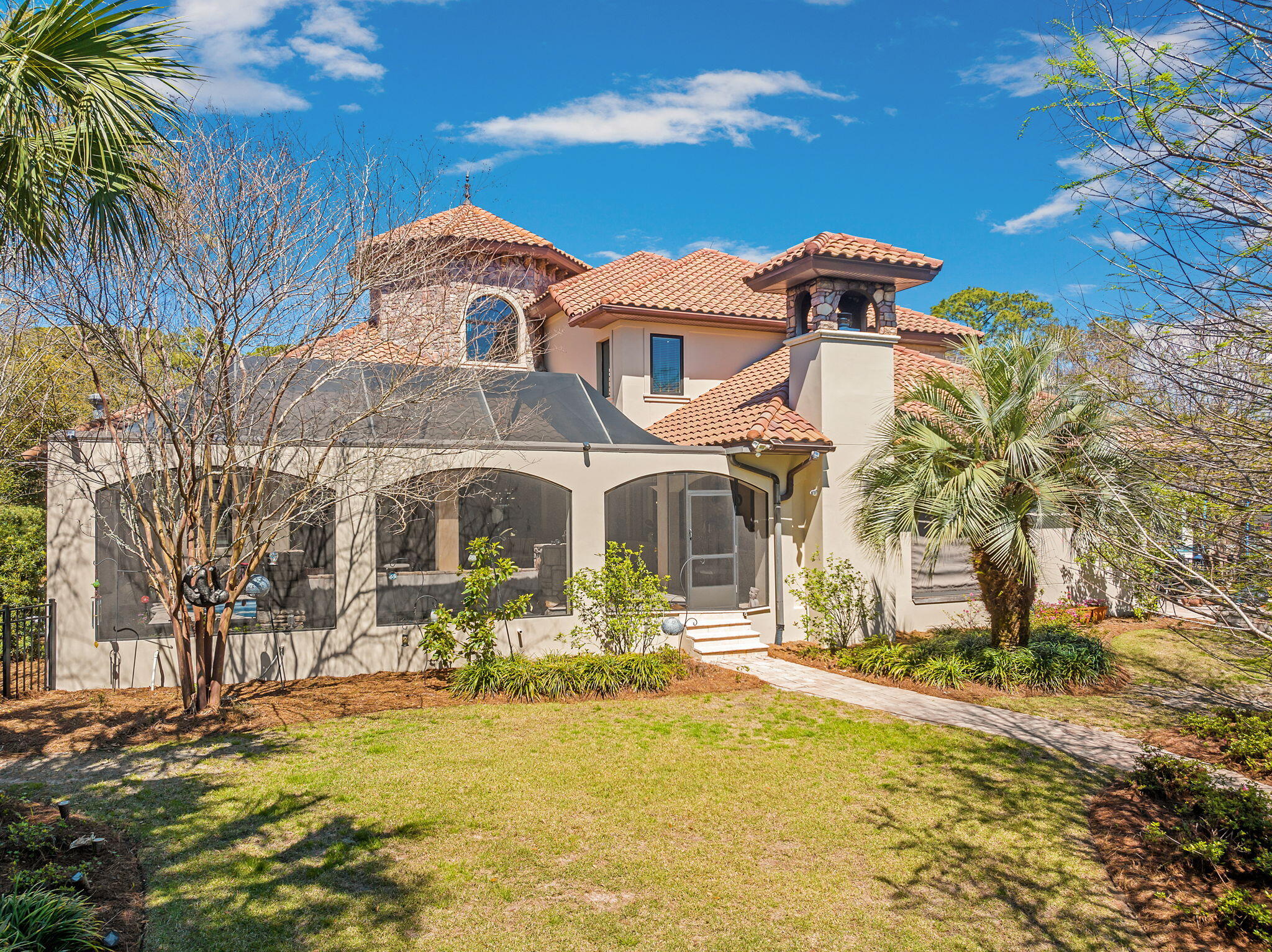 437 Admiral Court Destin, FL 32541 - Photo 56 of 100 a front view of a house with a yard