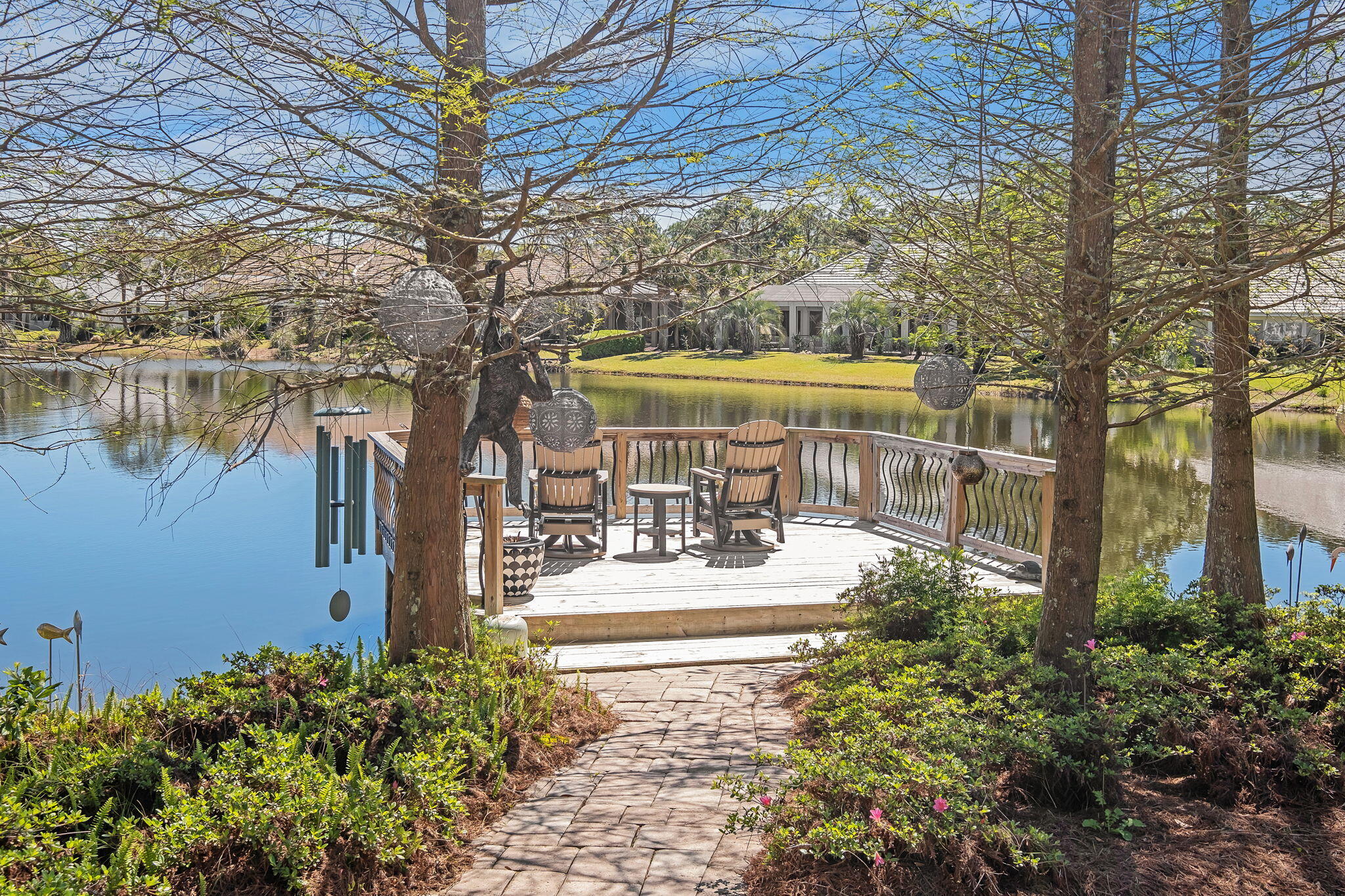 437 Admiral Court Destin, FL 32541 - Photo 59 of 100 a view of a house with garden and sitting area