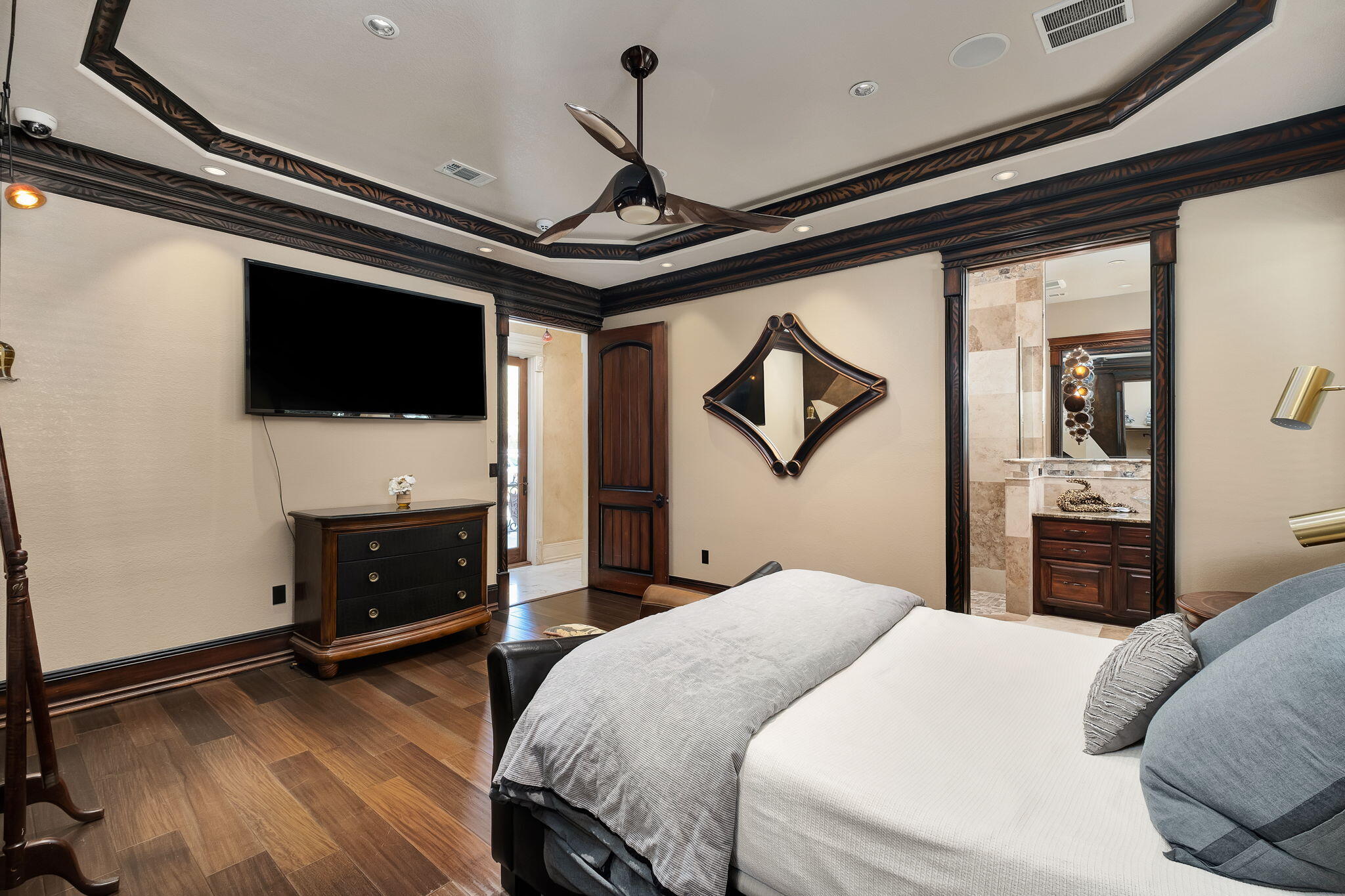 437 Admiral Court Destin, FL 32541 - Photo 66 of 100 a bedroom with a bed dresser and a flat screen tv