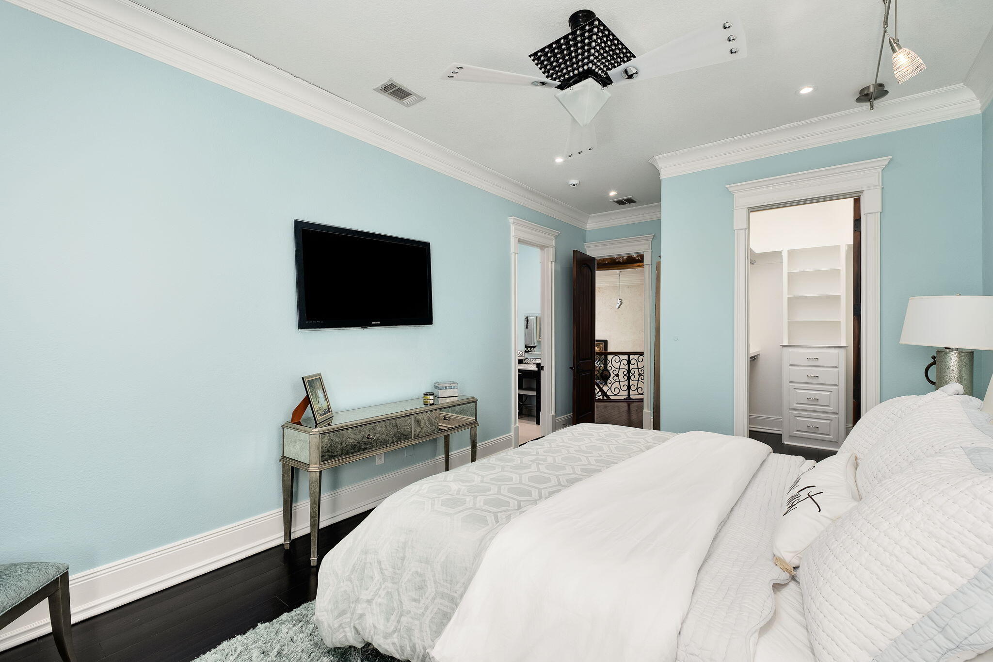 437 Admiral Court Destin, FL 32541 - Photo 80 of 100 a bedroom with a bed and a flat screen tv