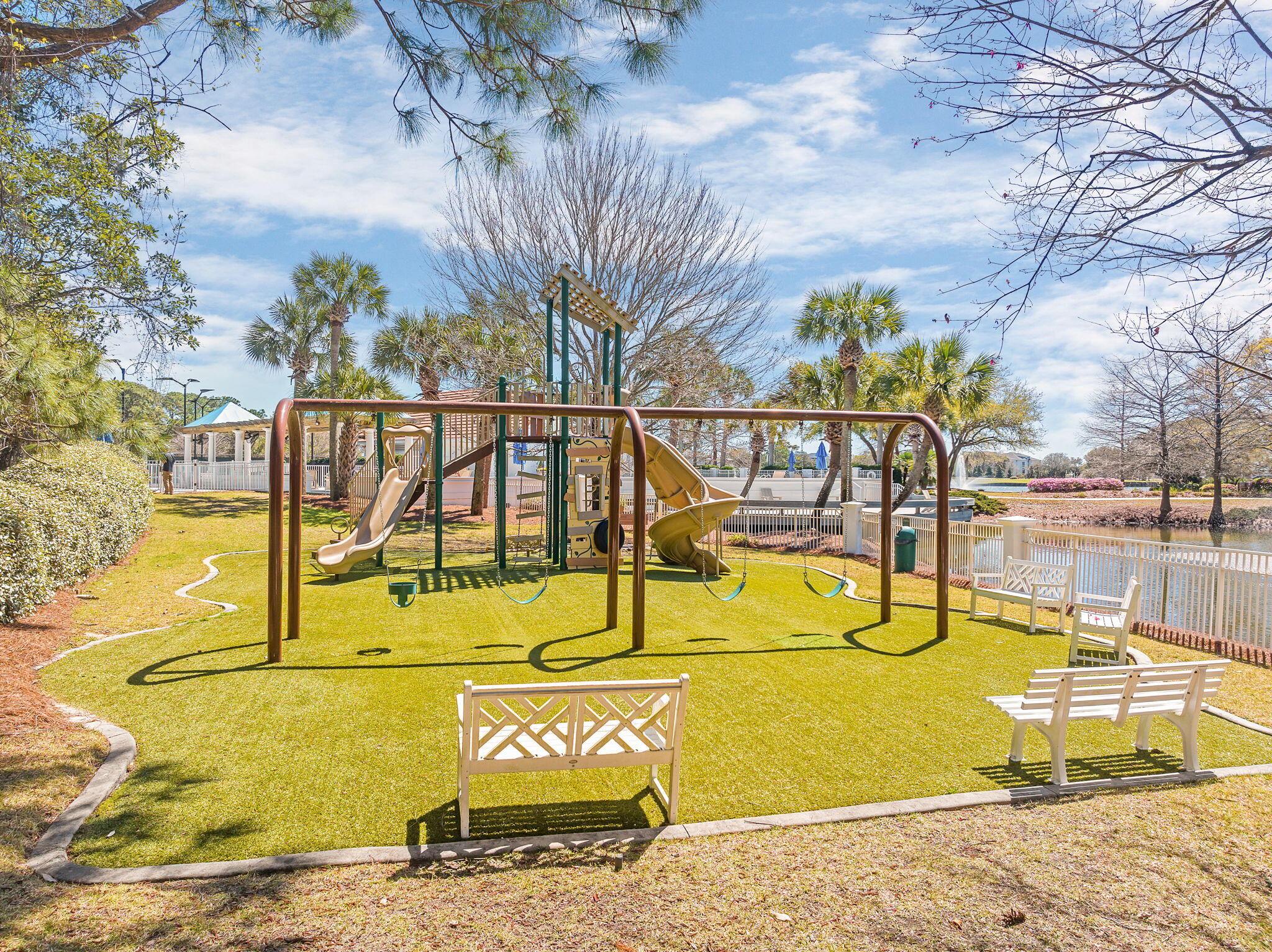 437 Admiral Court Destin, FL 32541 - Photo 90 of 100 a view of a swimming pool with a bench
