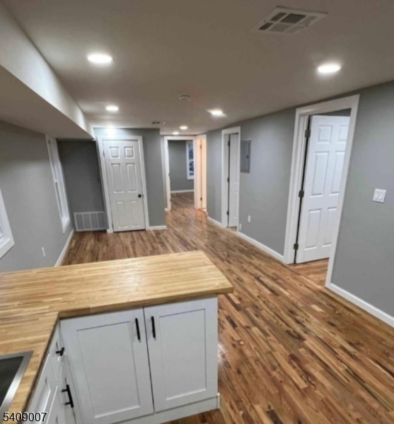 149 3rd Street Elizabeth Port, NJ 07206 - Photo 2 of 6 a bathroom with a sink and a mirror