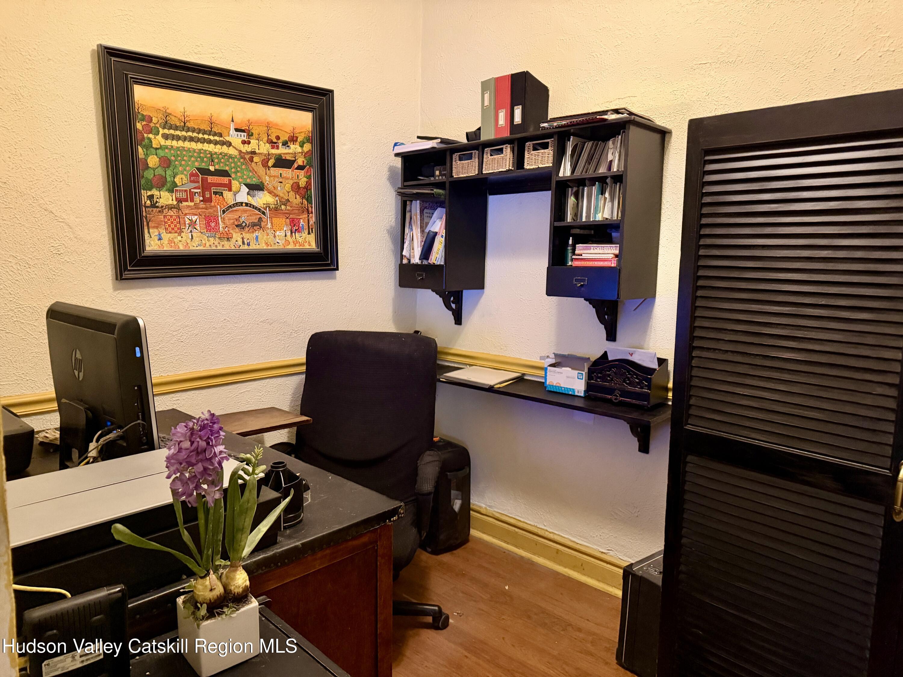 20 8th Street Hudson, NY 12534 - Photo 13 of 29 a work room with furniture and wooden floor