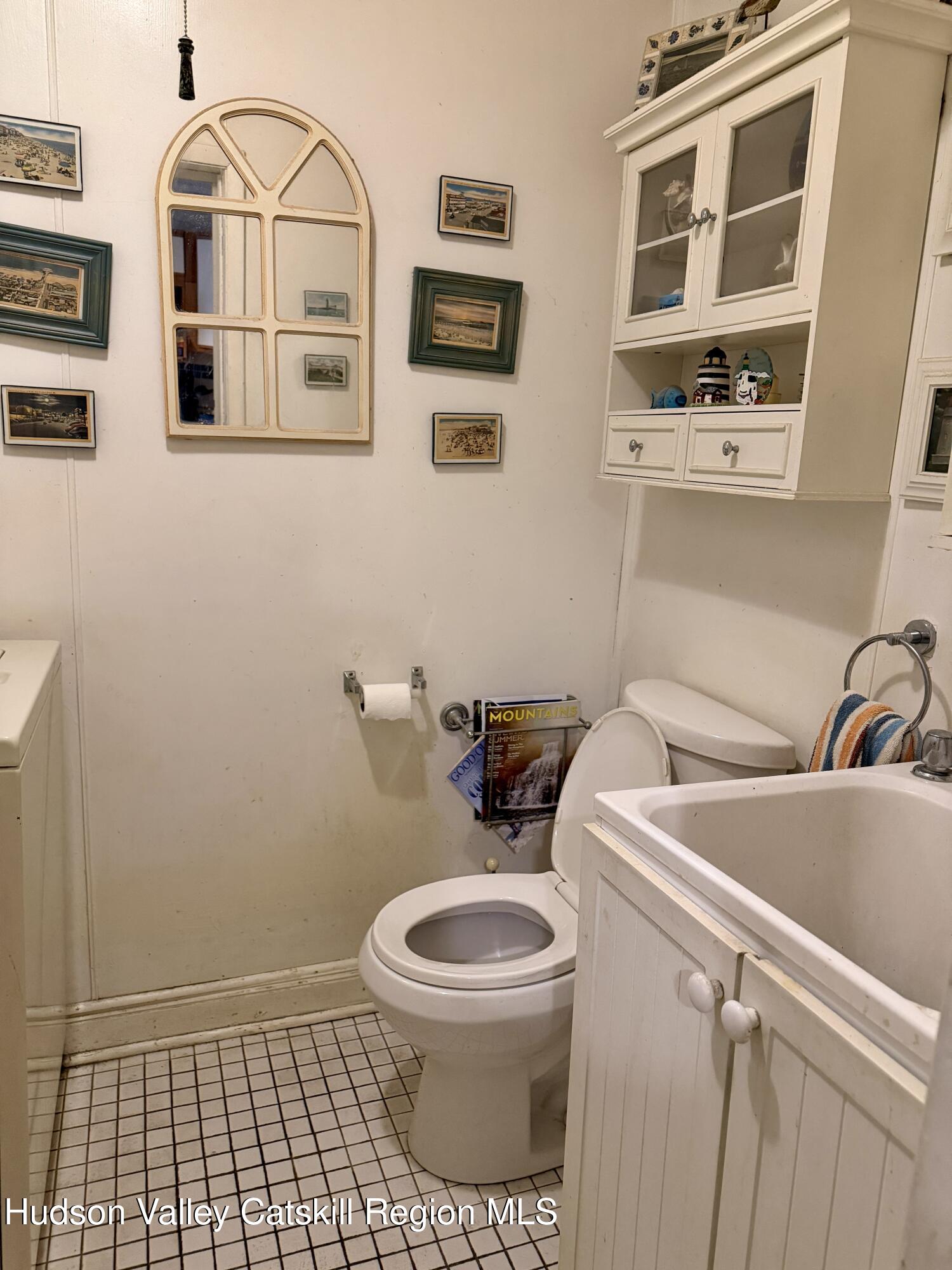 20 8th Street Hudson, NY 12534 - Photo 14 of 29 a bathroom with a toilet and a sink