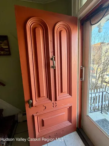 a kitchen with stainless steel appliances granite countertop a refrigerator a stove a sink and a microwave