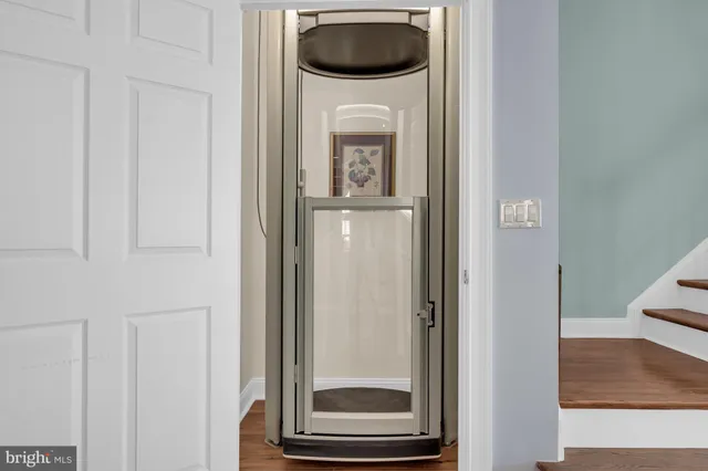 a view of a livingroom from a corridor