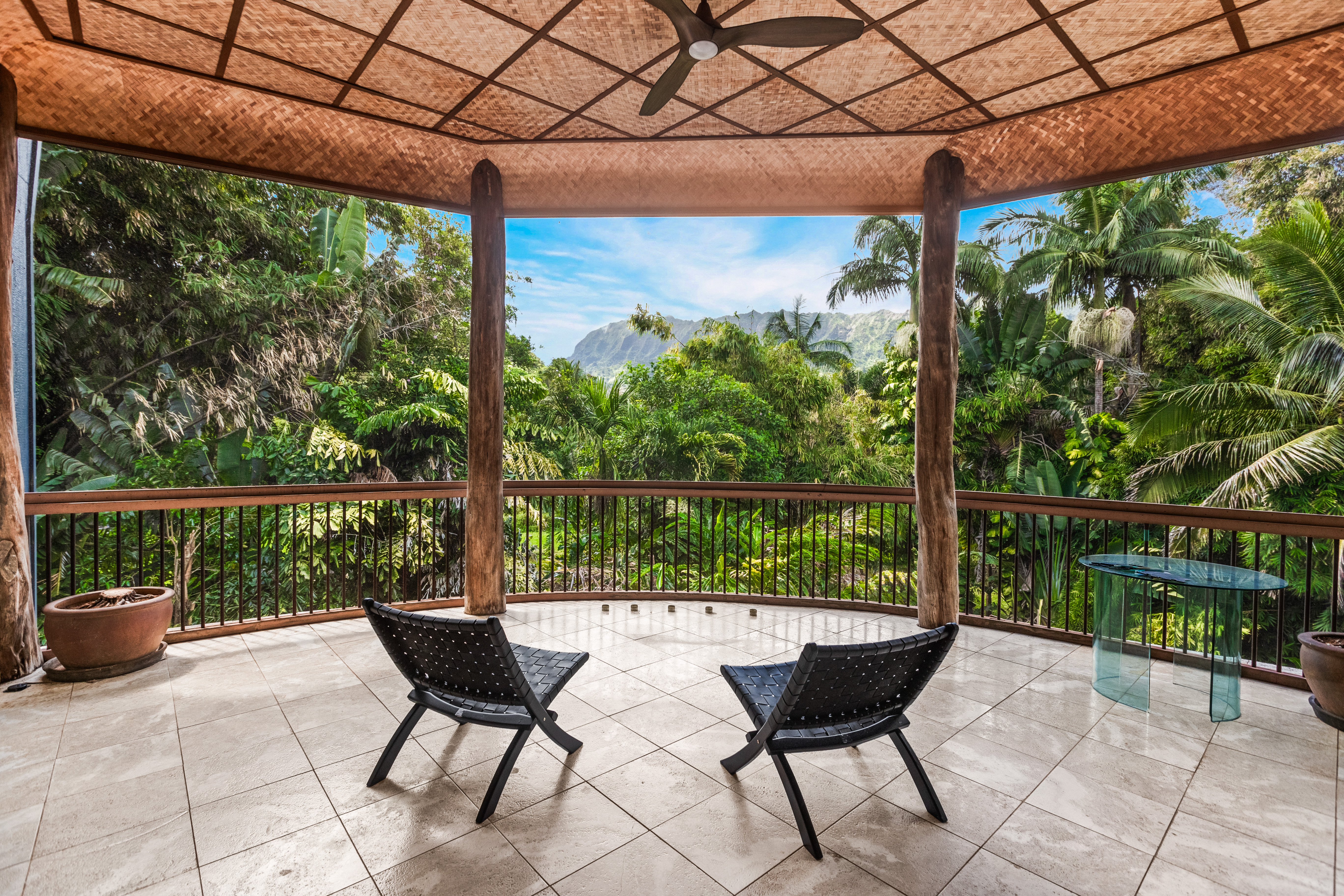 4558 A Ananalu Road Hanalei, HI 96714 - Photo 1 of 25 a view of a chairs and table in the balcony