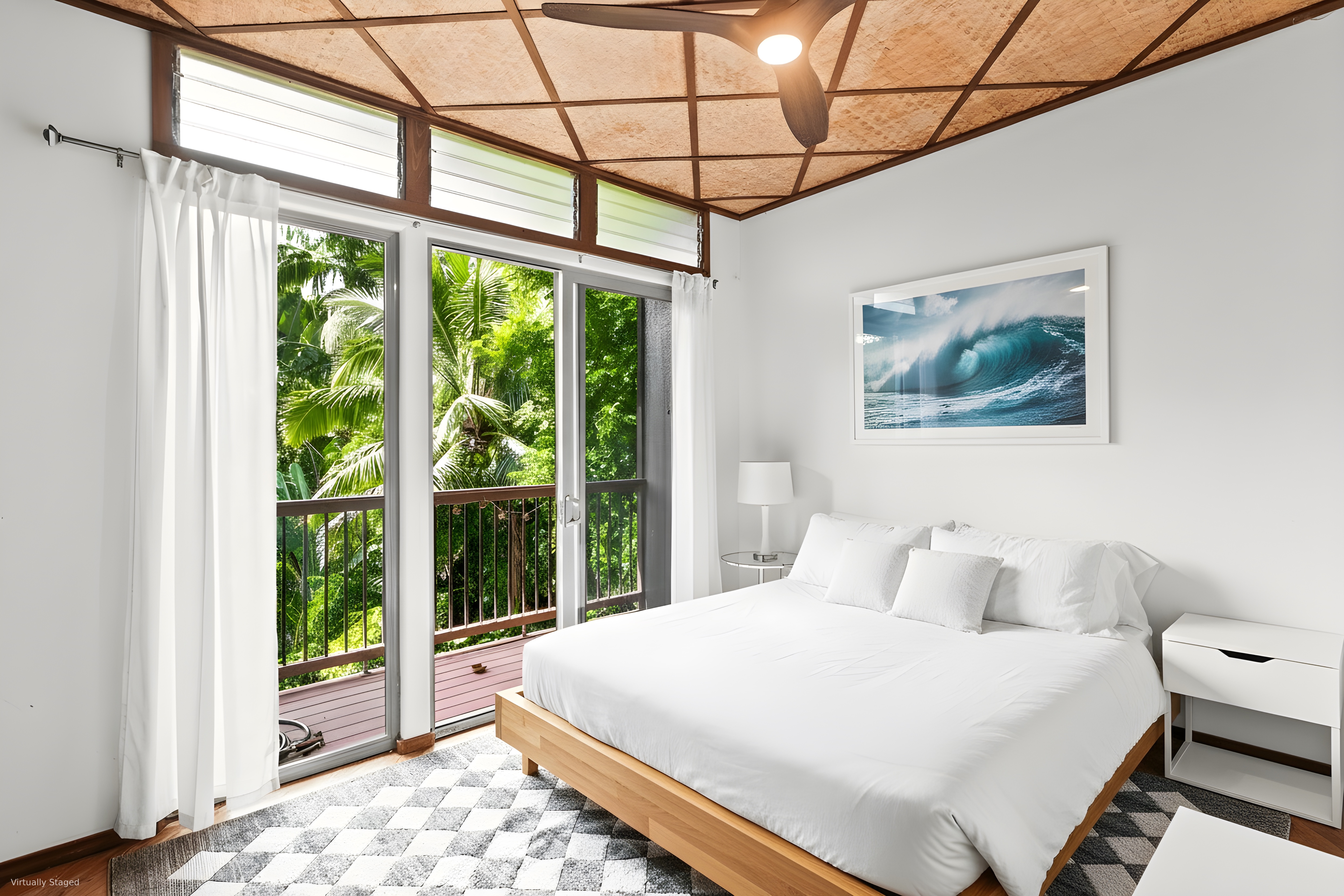 4558 A Ananalu Road Hanalei, HI 96714 - Photo 13 of 25 a bedroom with a large bed and a window