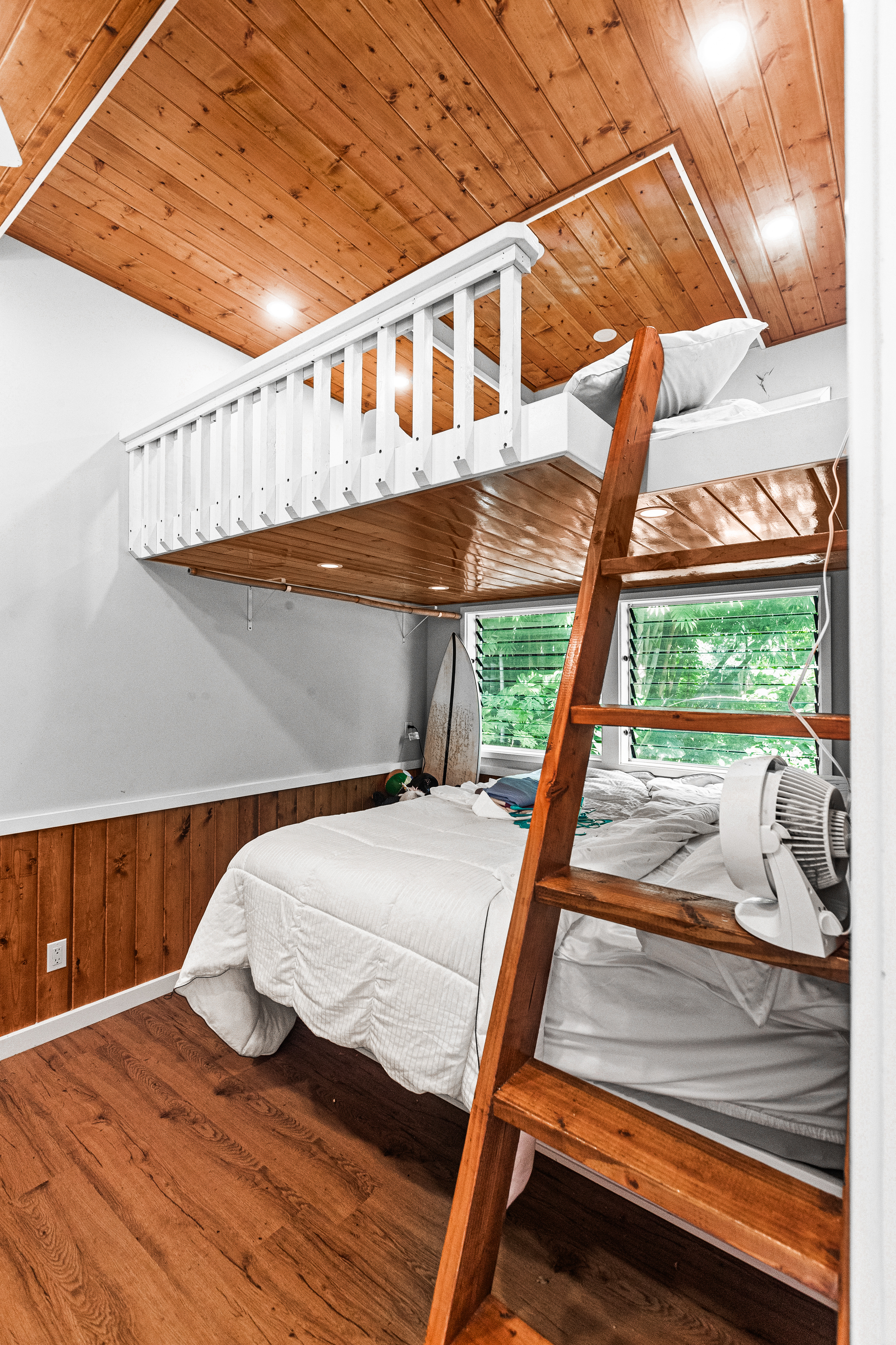 4558 A Ananalu Road Hanalei, HI 96714 - Photo 16 of 25 a bedroom with a bed and a window