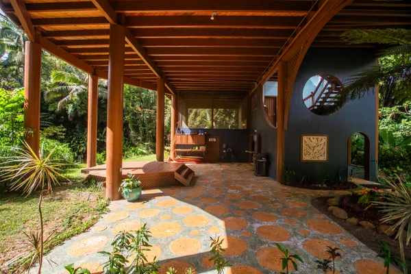 a outdoor space with swimming pool table and chairs