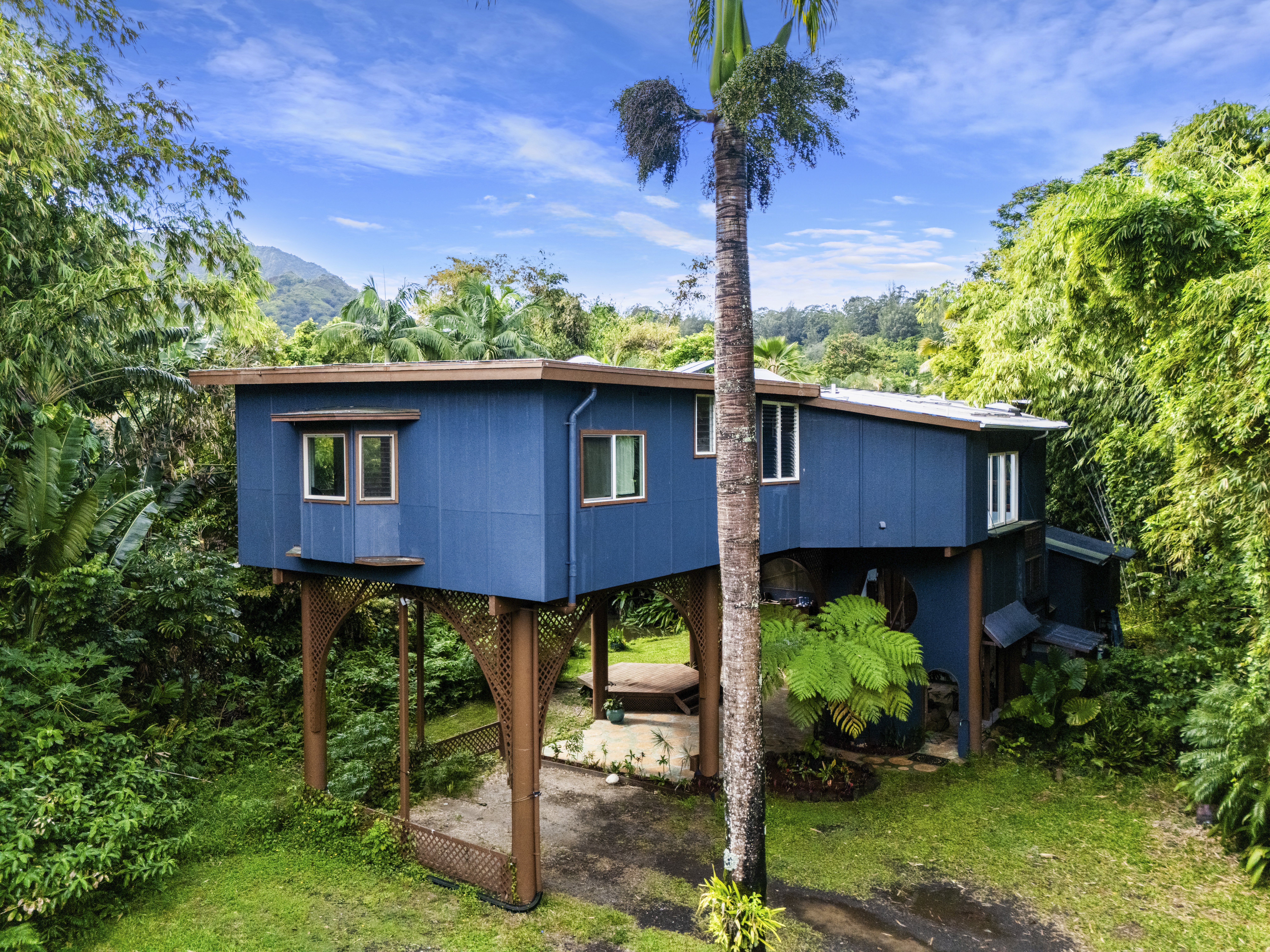 4558 A Ananalu Road Hanalei, HI 96714 - Photo 24 of 25 a front view of a house with porch