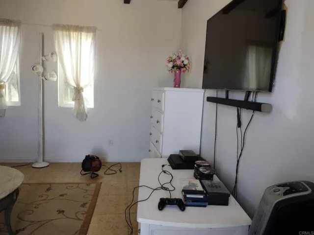 a bathroom with a sink toilet and mirror