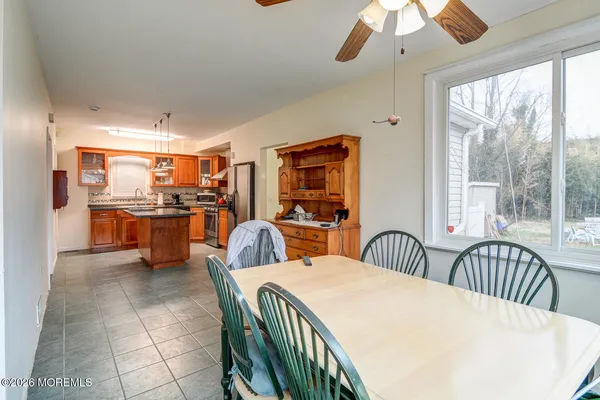 a view of a kitchen and dining room