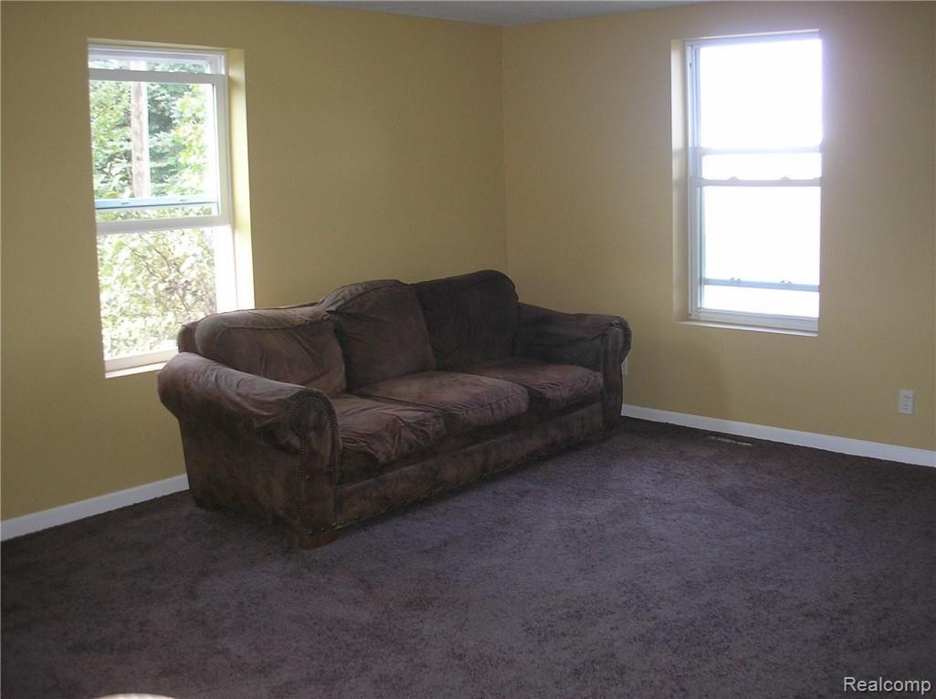 6766 East Deckerville Road Deford, MI 48729 - Photo 3 of 10 6766 Deckerville living room.jpg