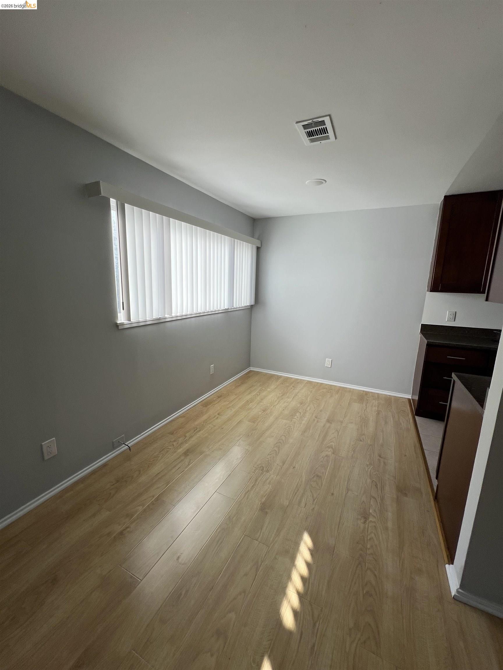 2636 Warring Street, Unit 204 Berkeley, CA 94704 - Photo 3 of 10 a view of an empty room with a window