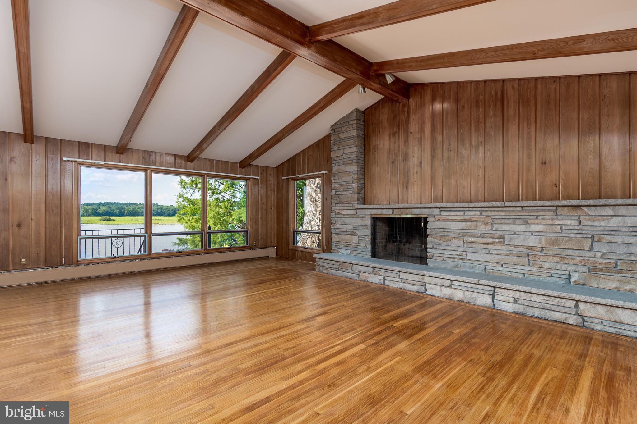 28178 Riverside Drive Salisbury, MD 21801 - Photo 32 of 73 Stone fireplace for cozy winter nights