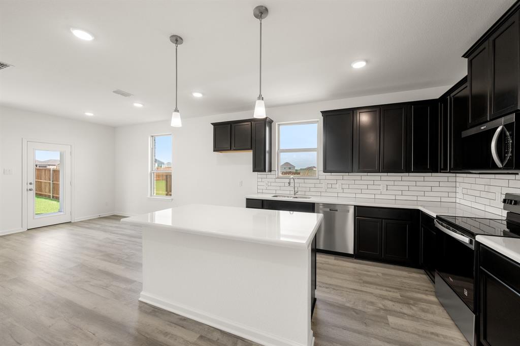 125 Toftrees Drive Cleburne, TX 76031 - Photo 4 of 27 125 Toftrees- Kitchen-1