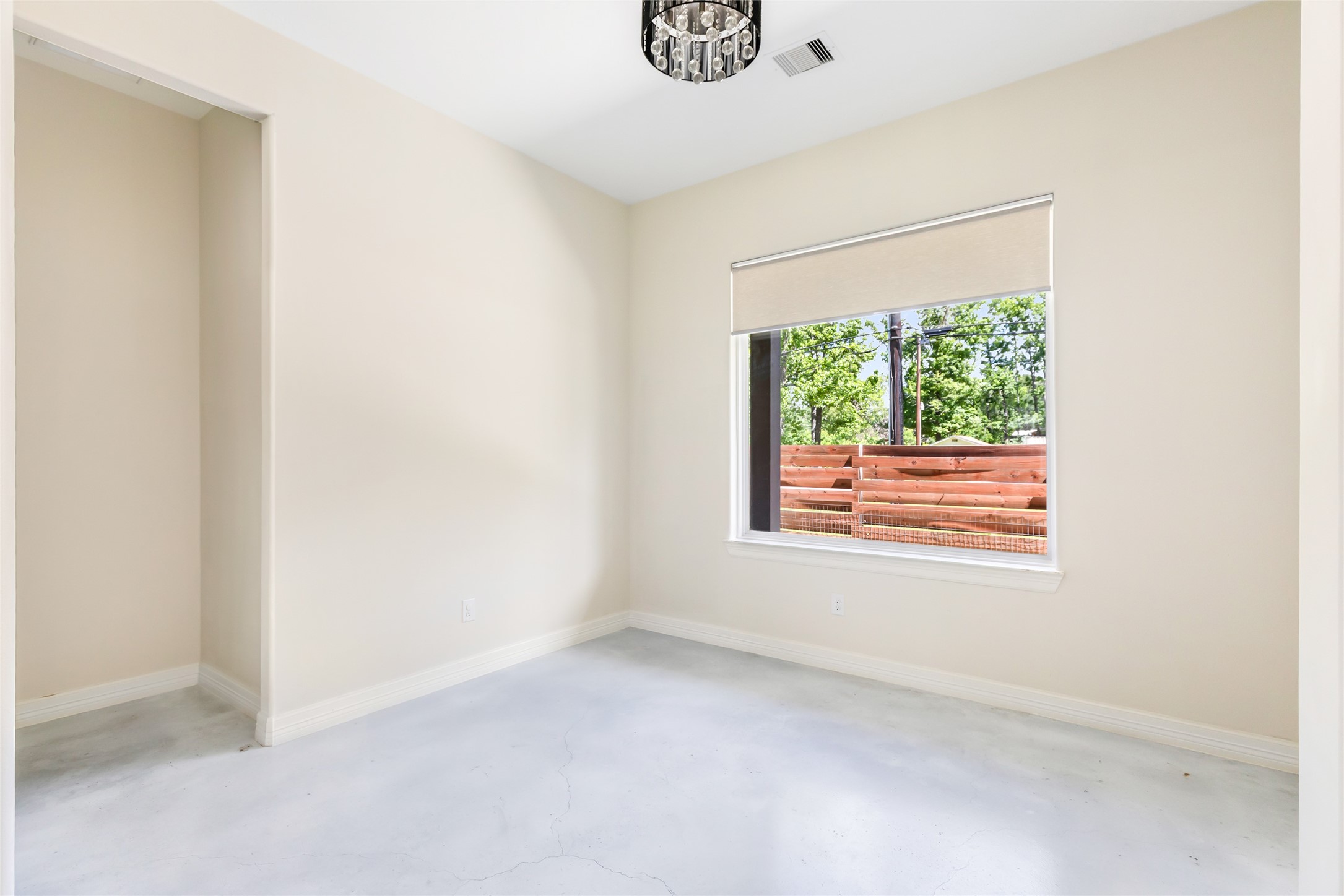 538 Magnolia Point Drive Huffman, TX 77336 - Photo 9 of 30 Space at front of home near entry with large picture window- great for office, sitting area, of dining room