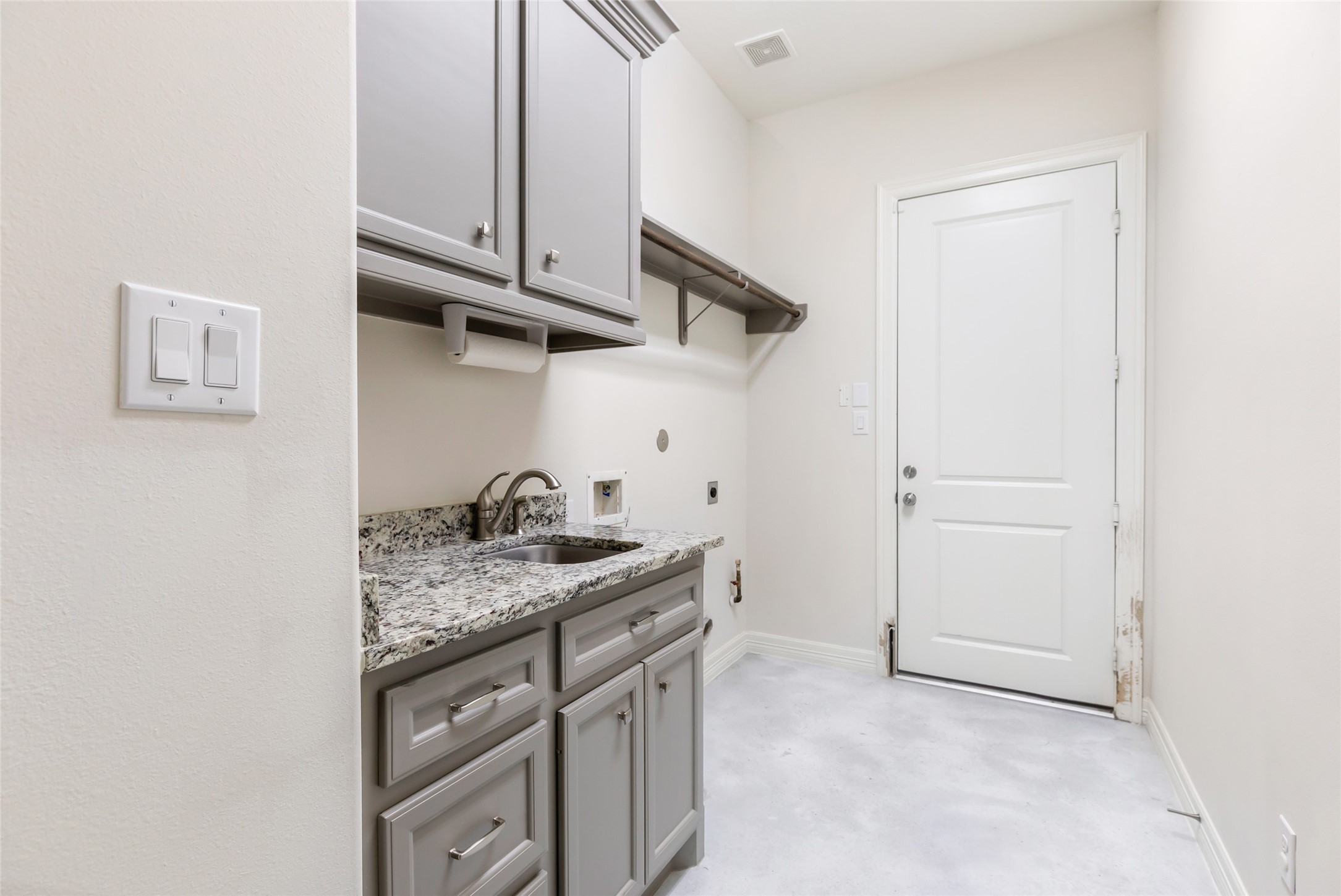 538 Magnolia Point Drive Huffman, TX 77336 - Photo 17 of 30 Large laundry room with access to garage, extra storage, and sink