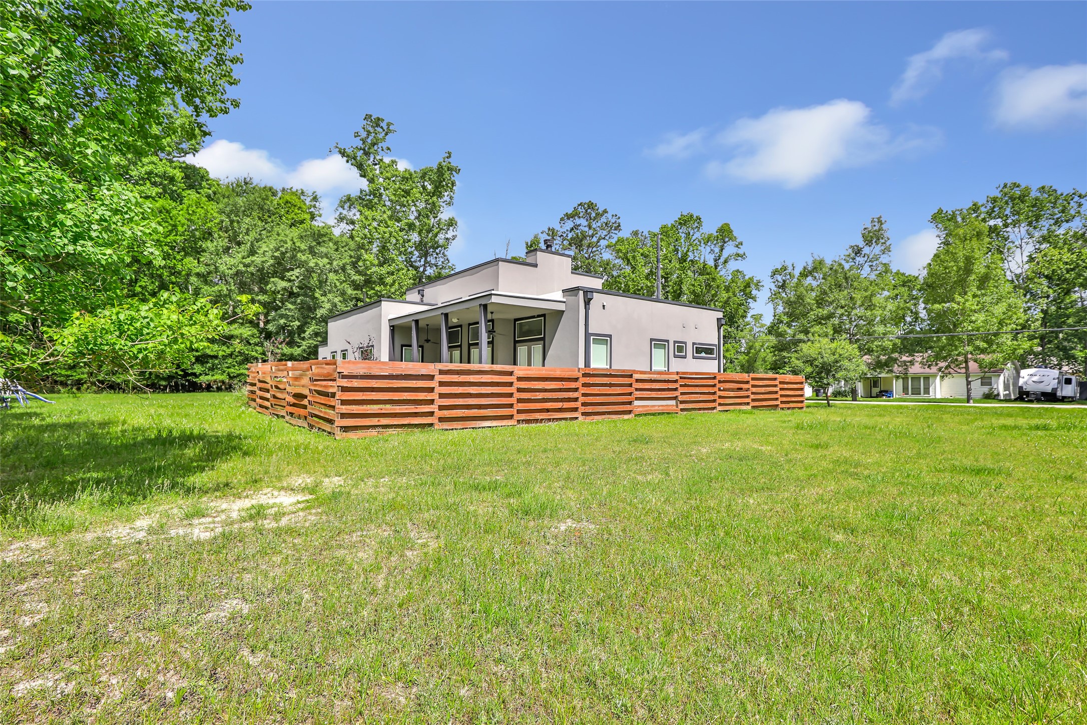 538 Magnolia Point Drive Huffman, TX 77336 - Photo 24 of 30 View of back of home. Surrounding land goes with the home