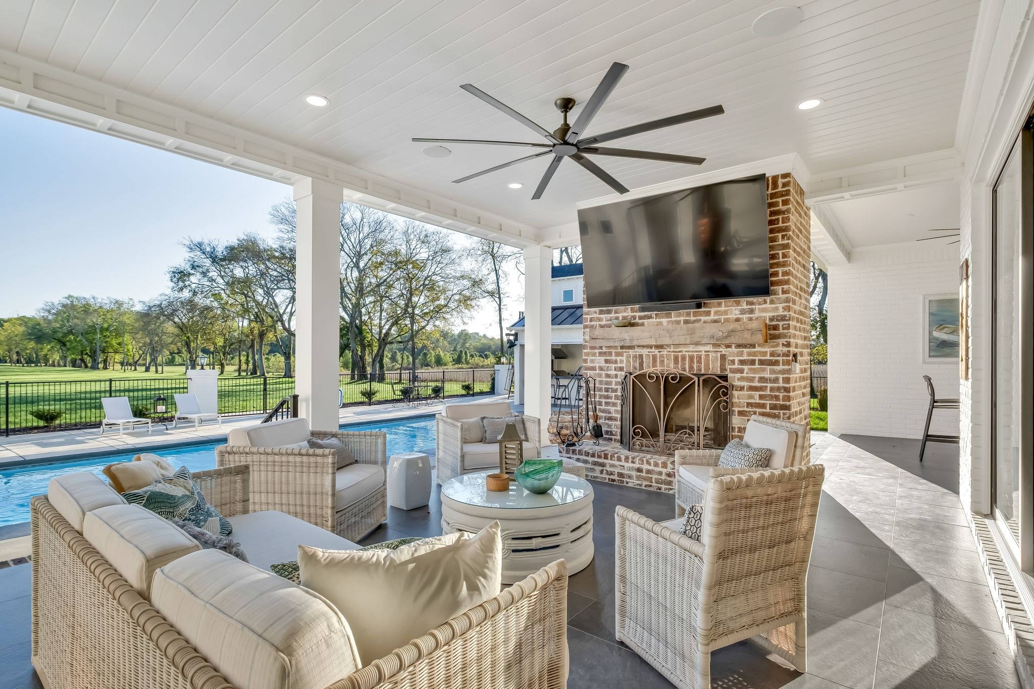 4855 Murfreesboro Road Arrington, TN 37014 - Photo 14 of 63 a living room with furniture a fireplace and a flat screen tv