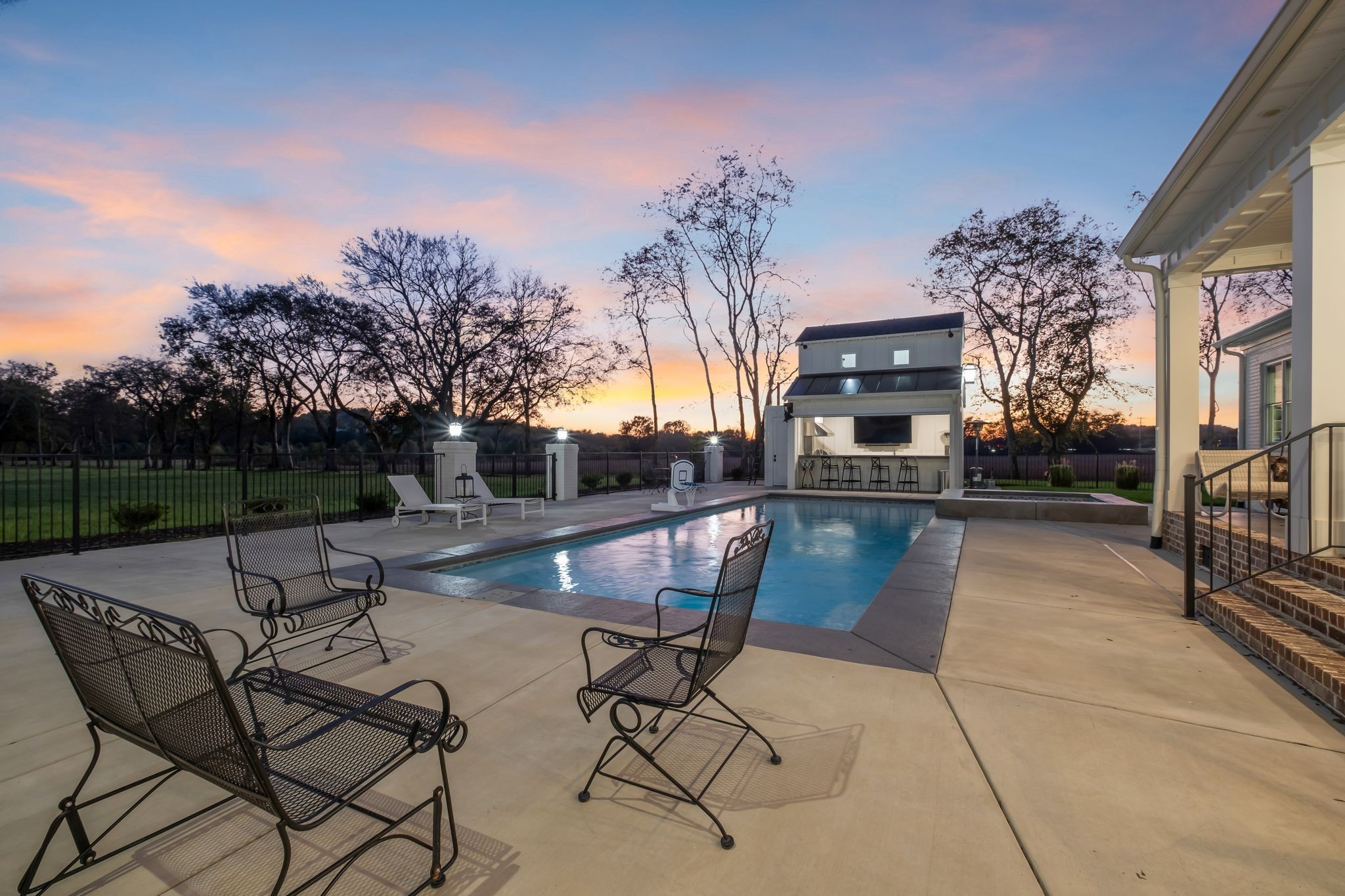 4855 Murfreesboro Road Arrington, TN 37014 - Photo 15 of 63 a patio with glass top table and chairs