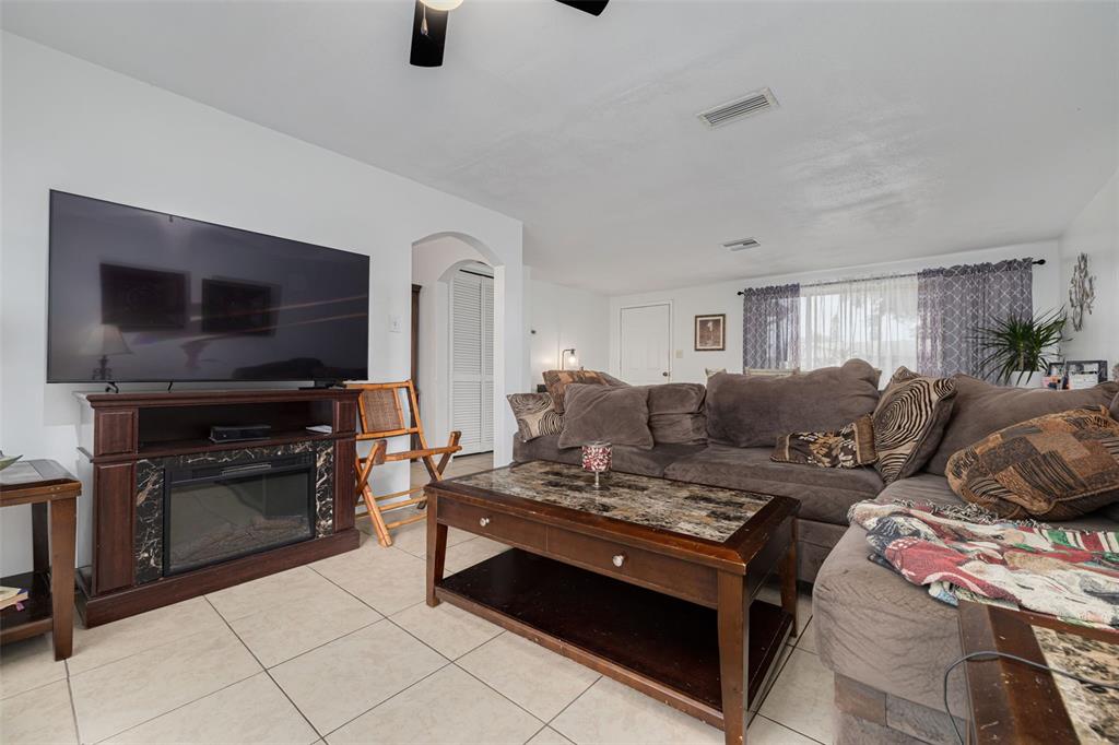 3322 Fairmount Drive Holiday, FL 34691 - Photo 26 of 29 a living room with furniture and a flat screen tv