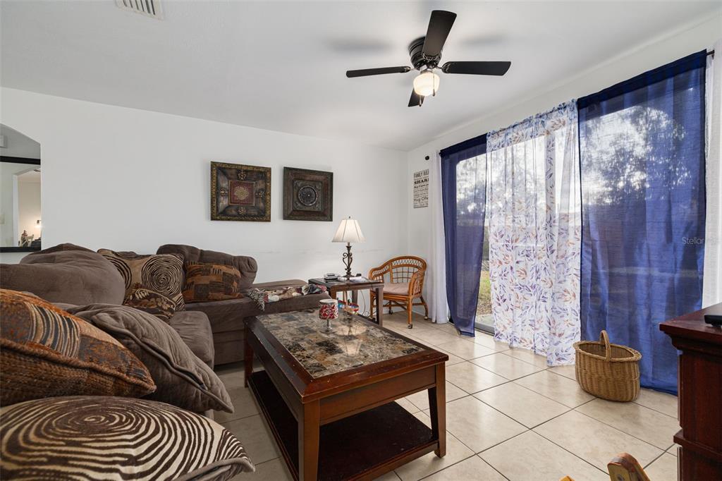 3322 Fairmount Drive Holiday, FL 34691 - Photo 27 of 29 a living room with furniture and a flat screen tv