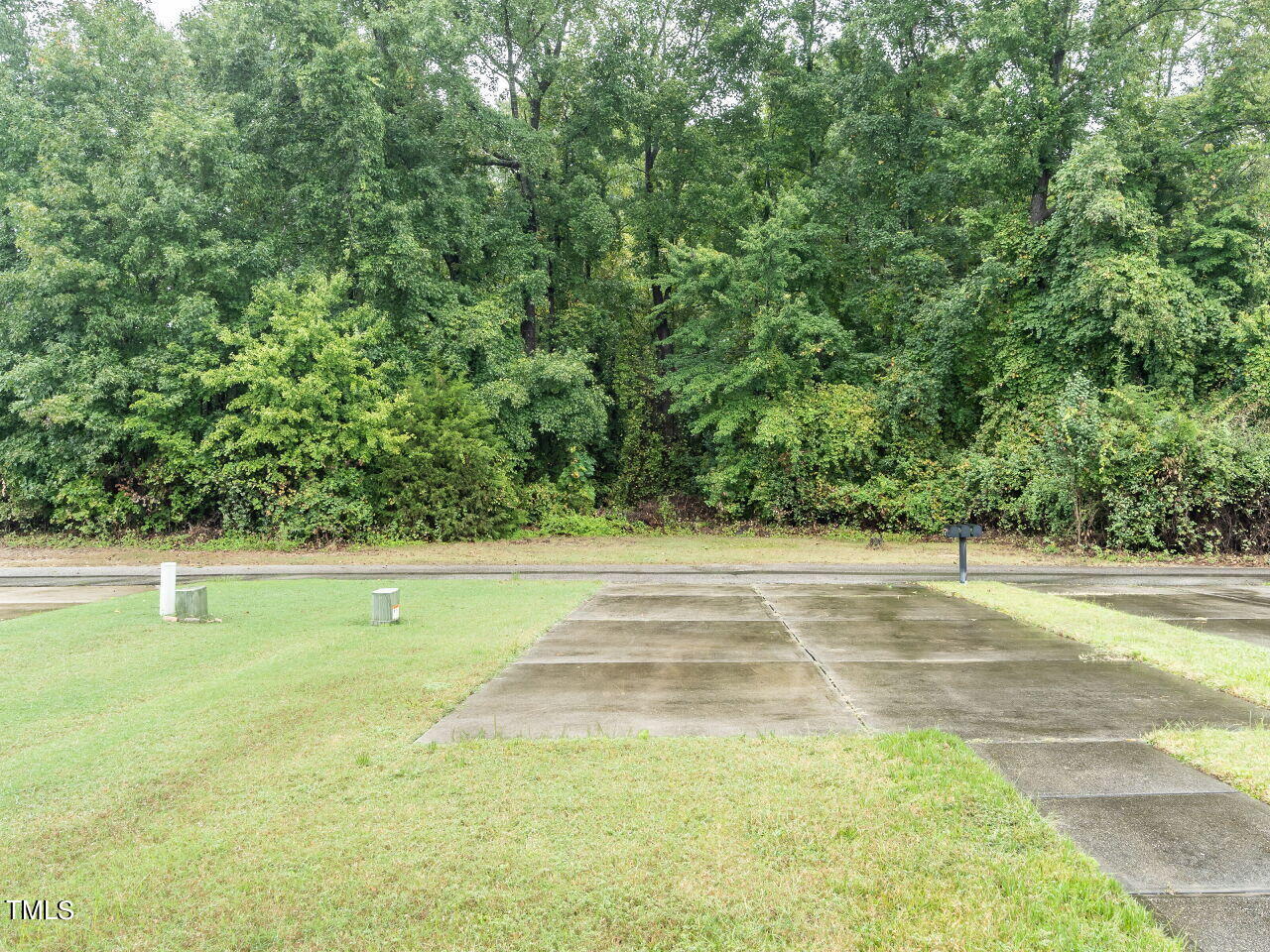 585 Pinecroft Drive Clayton, NC 27520 - Photo 22 of 26 a view of a tennis court