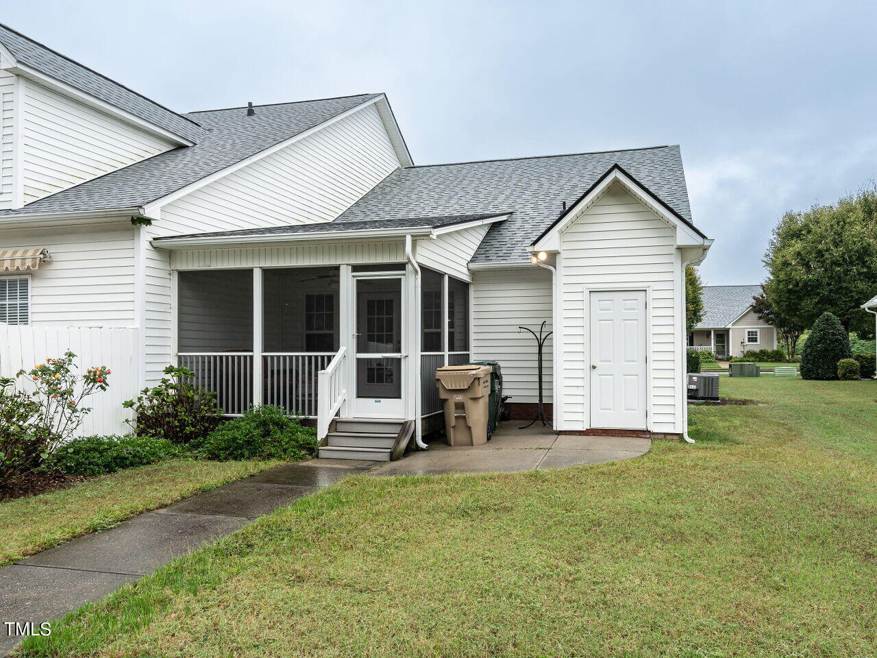 585 Pinecroft Drive Clayton, NC 27520 - Photo 23 of 26 a view of a house with garden