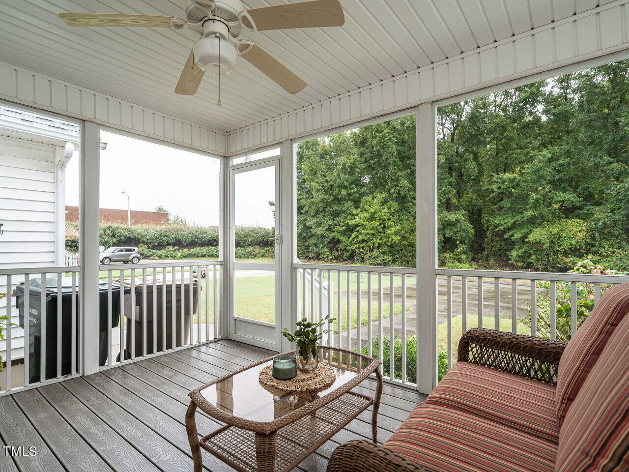 585 Pinecroft Drive Clayton, NC 27520 - Photo 24 of 26 a balcony with furniture and wooden floor