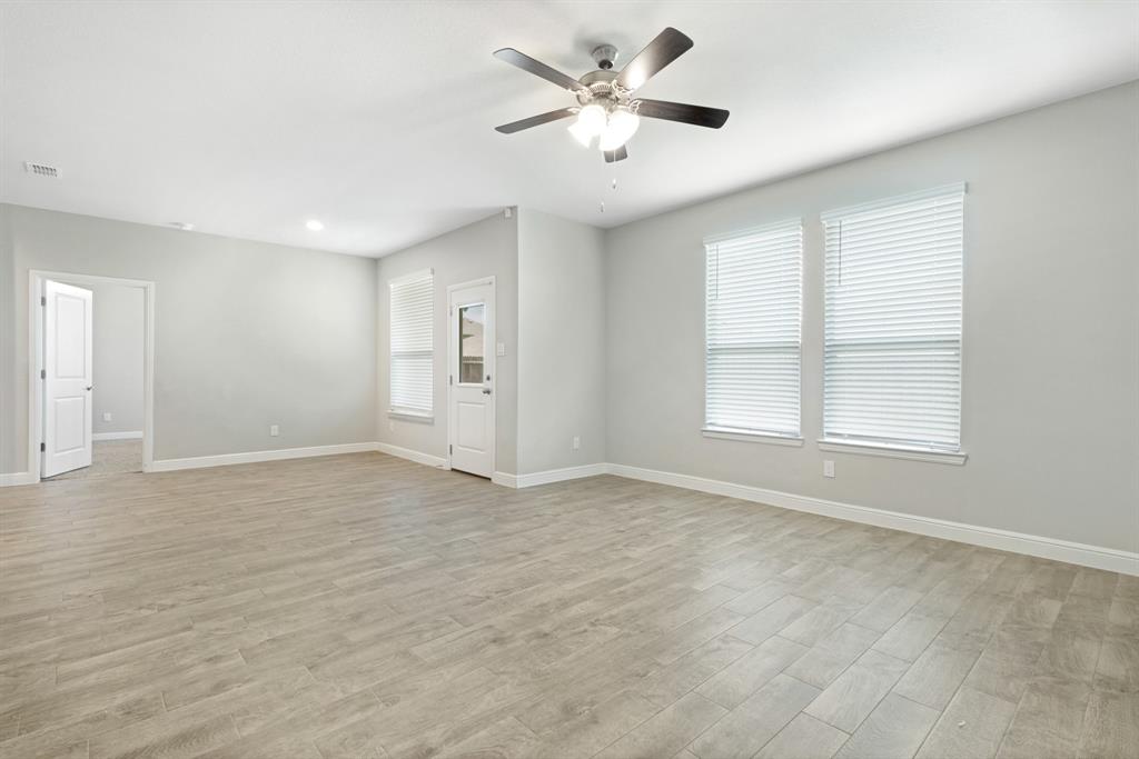 820 Wilmott Terrace Justin, TX 76247 - Photo 10 of 22 a view of an empty room with a window
