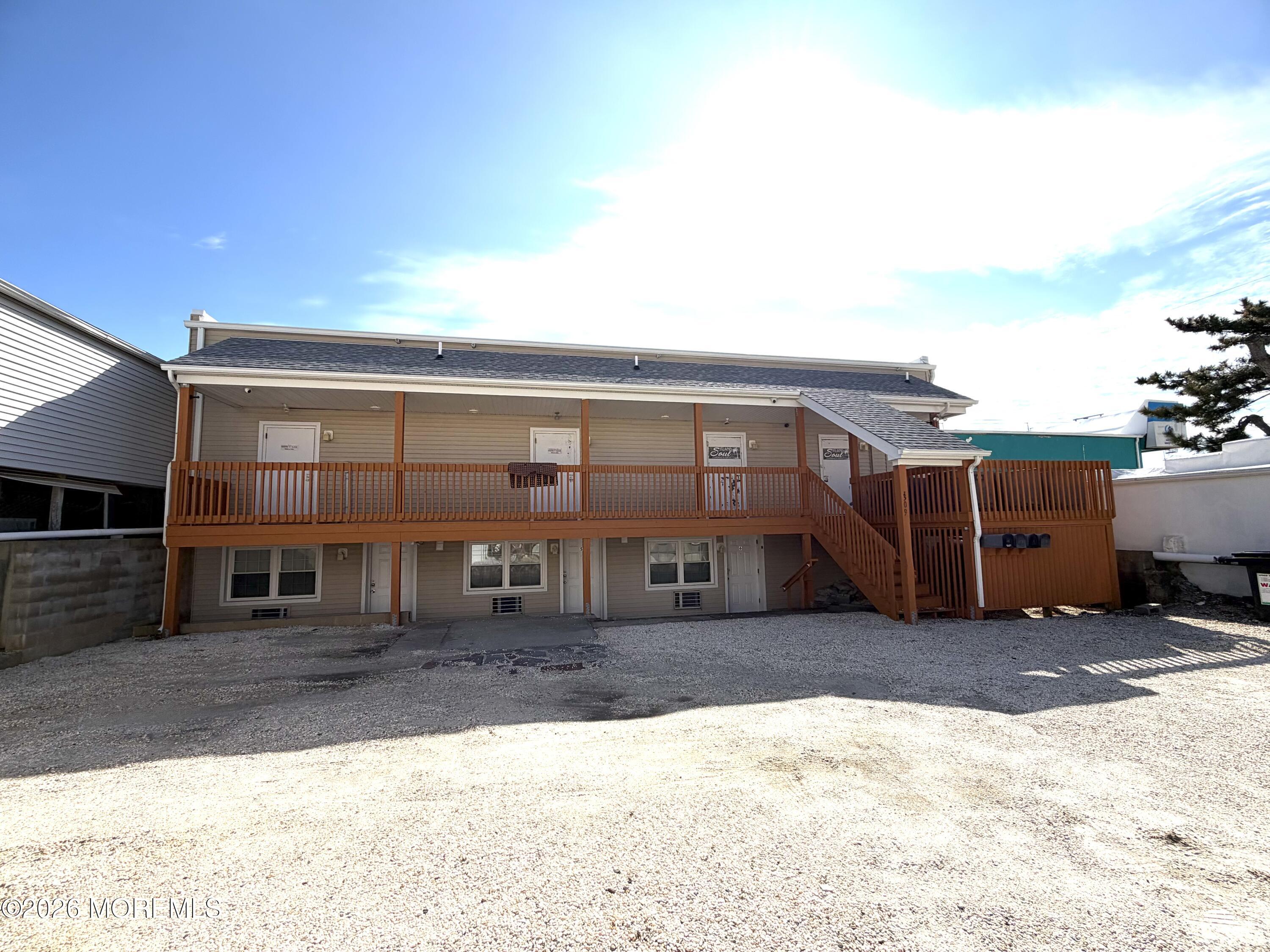 Ocean Terrace Seaside Heights, NJ 08751 - Photo 3 of 25 a front view of a house with a yard