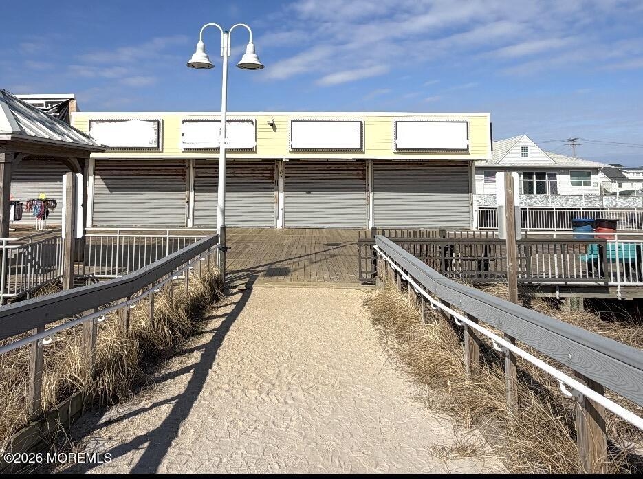 Ocean Terrace Seaside Heights, NJ 08751 - Photo 4 of 25 a view of balcony with a lot of wooden floor