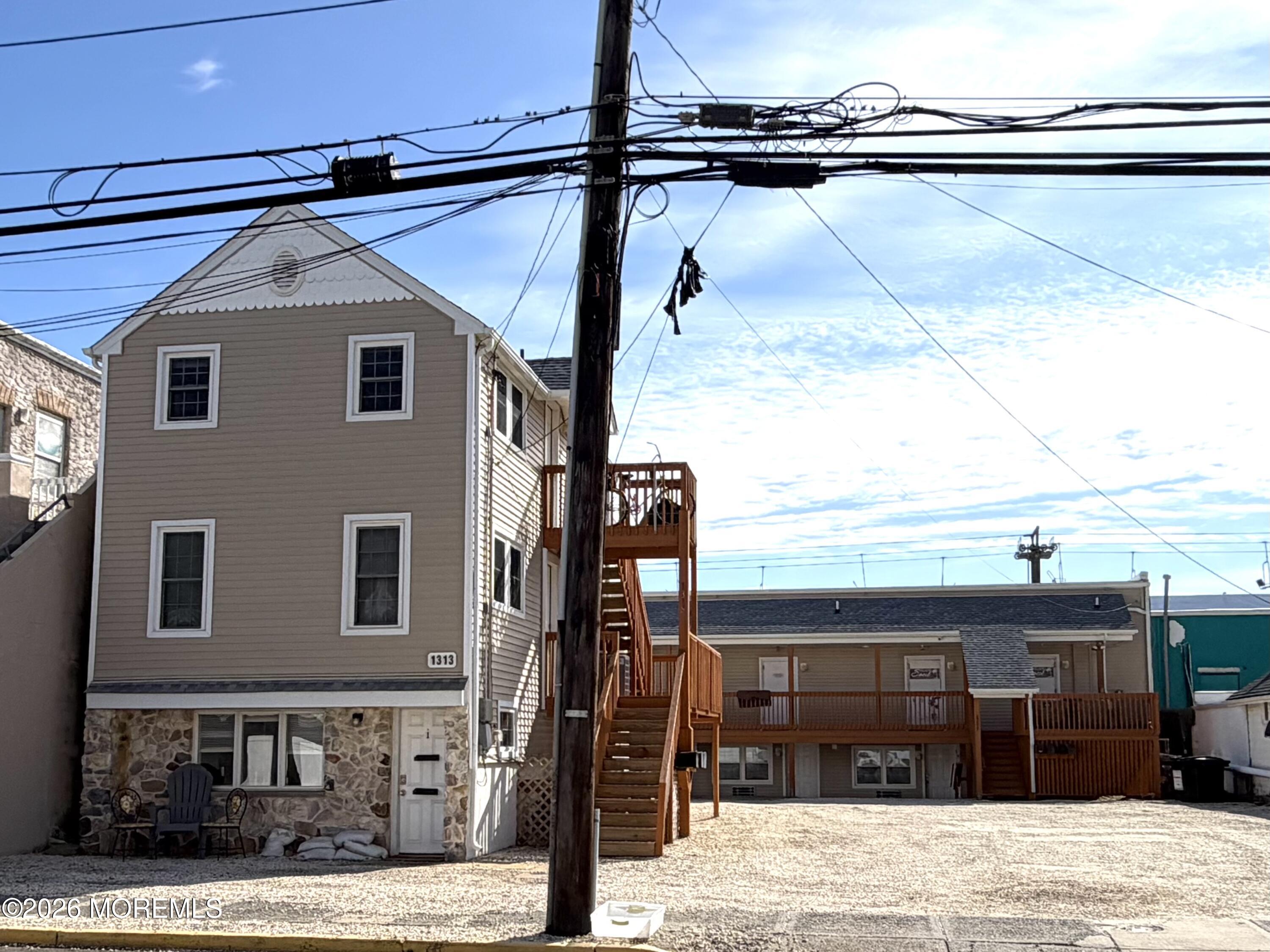 Ocean Terrace Seaside Heights, NJ 08751 - Photo 5 of 25 a front view of a house with a yard