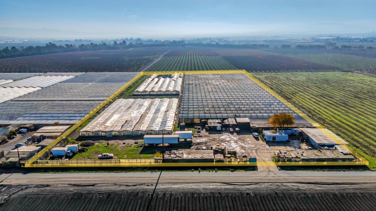 a view of small pool with seating area