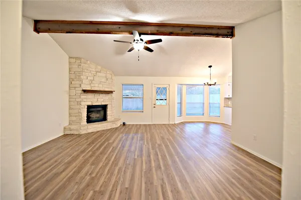 a view of a livingroom with wooden floor