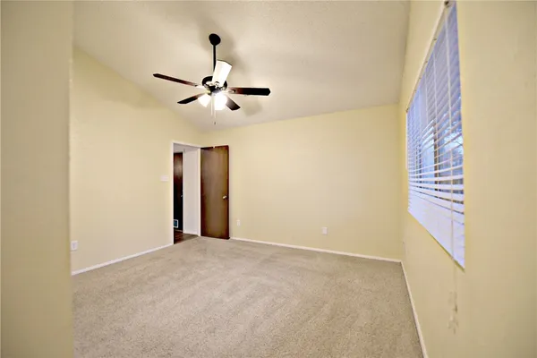a view of entryway with a fan